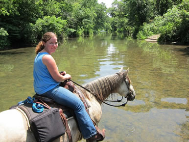 Crossing River on Horseback